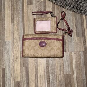 Coach wallet, handheld with carry along coin/credit card holder.